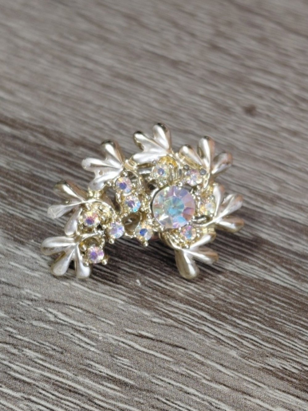 Iridescent Crystal Floral Brooch in Gold Tone